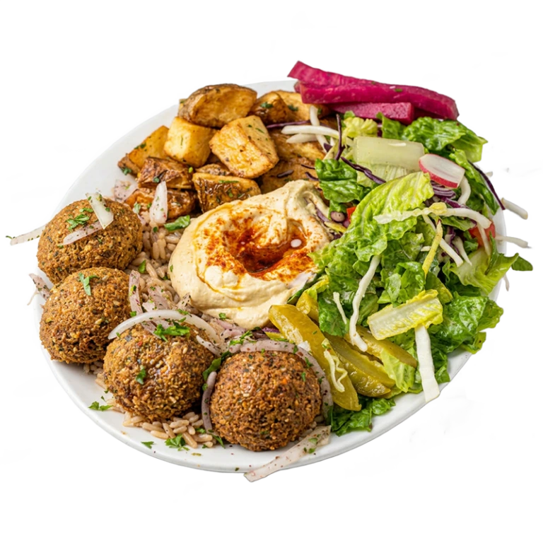 Vegetarian falafel plate with crispy falafel, hummus, roasted potatoes, fresh salad and pickled turnips from Shawarma Palace